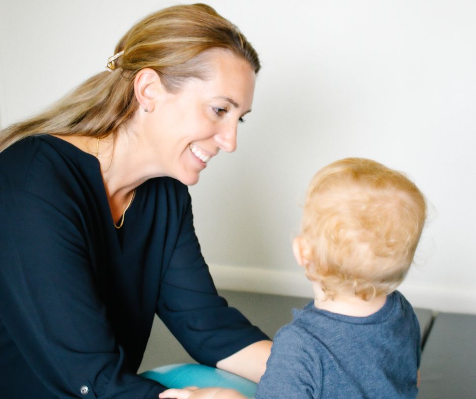 occupational therapist shown with child during occupational therapy session