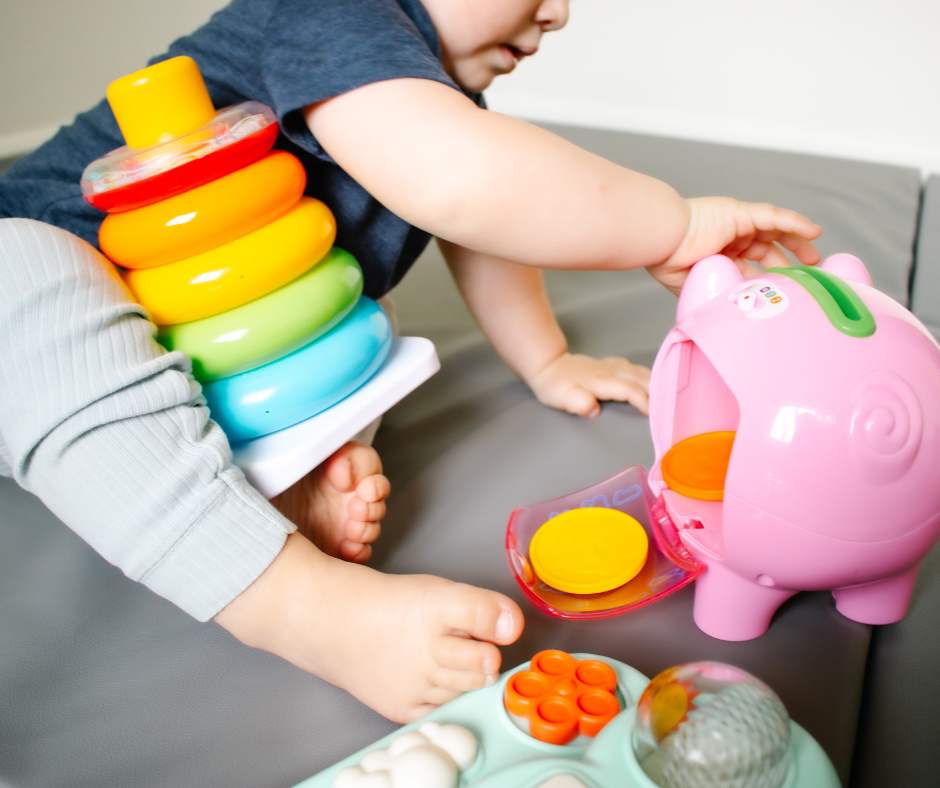 Children playing with colorful toys on a couch
