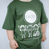 Child wearing a green t-shirt with EXCEL Therapy Services logo and illustrations.